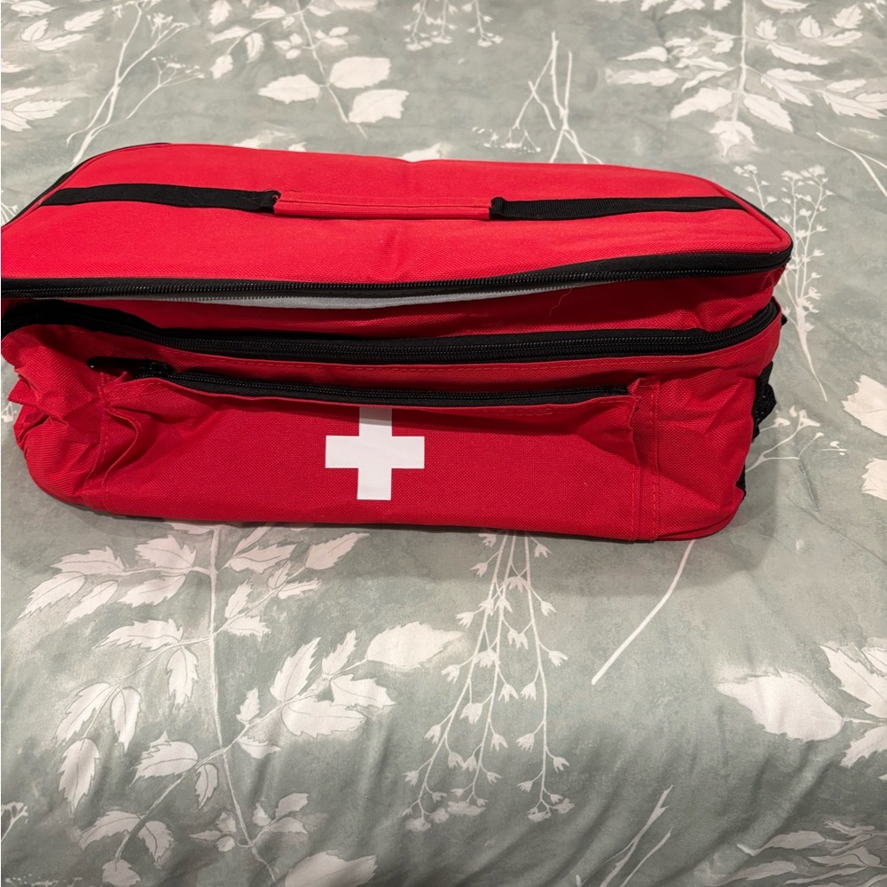 Red First Aid Kit Bag with White Cross